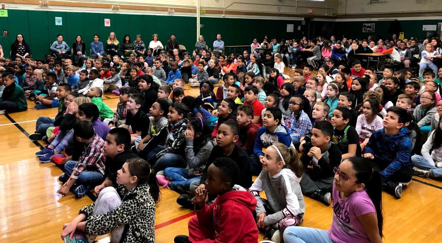 Students enjoying assembly.