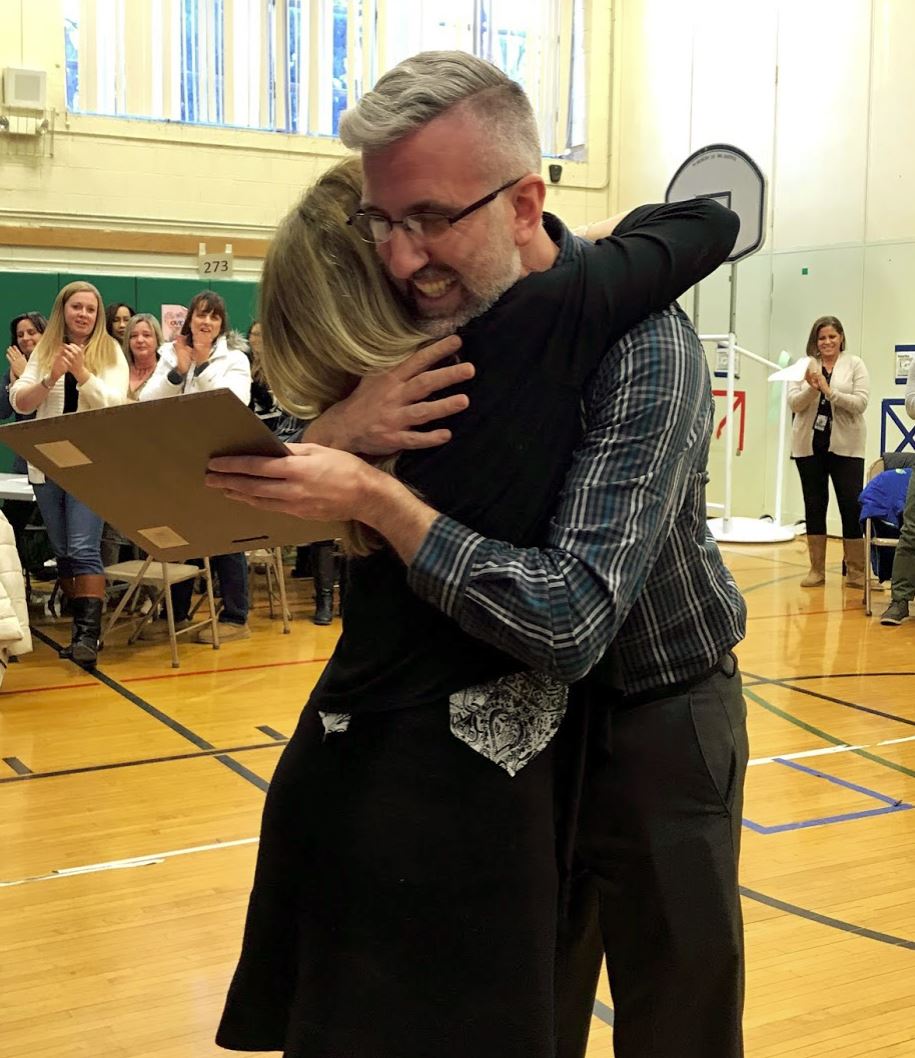 Assistant Principal, Ms. Lamarche hugging Mr. Formato