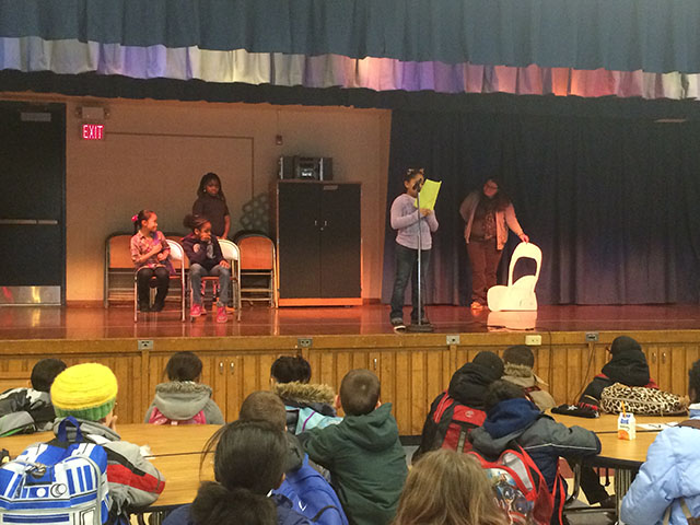 Students on stage for the Assembly 1