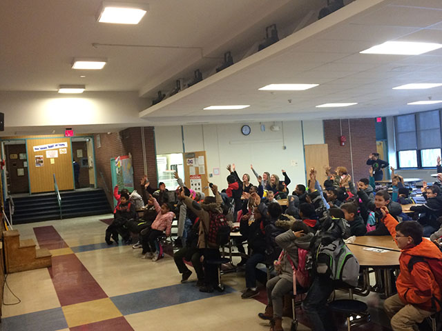 Students viewing the assembly