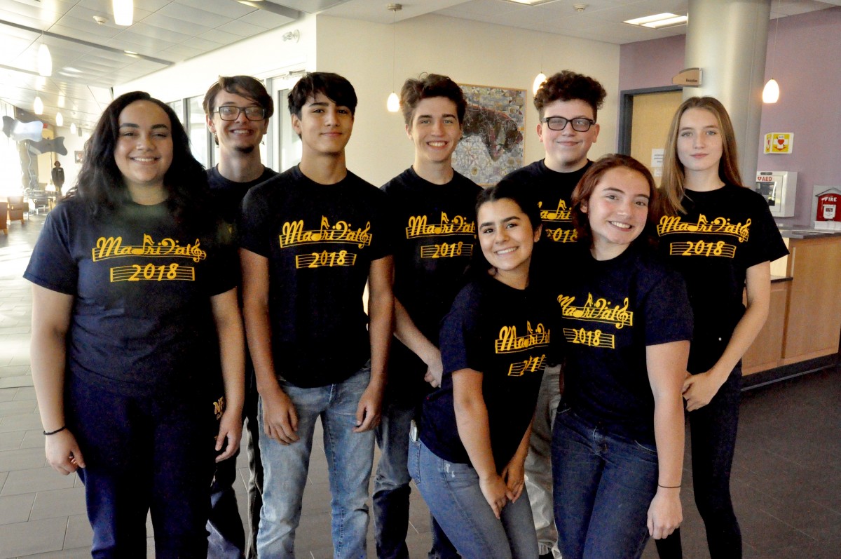 The Madrigals perform the Star Spangled Banner for the event