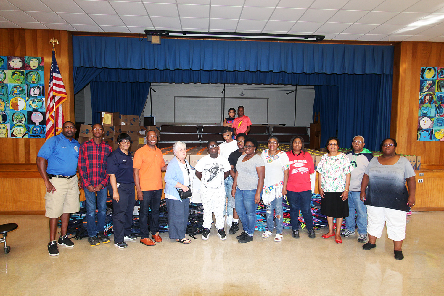 Volunteers ready to distribute backpacks