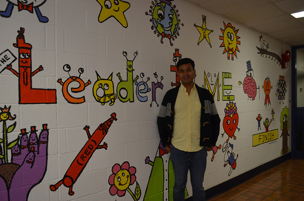 Mural at Fostertown School with the designer