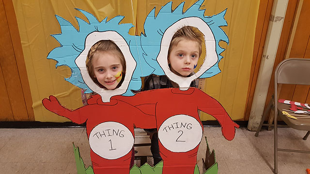 Students in the Thing 1 and Thing 2 cutout.