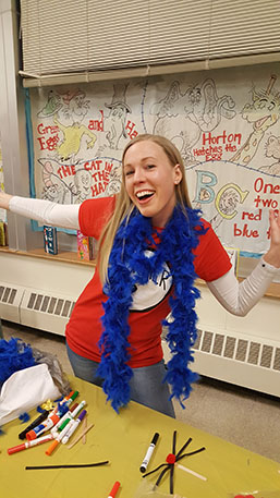 A teacher enjoying Dr. Suess Night