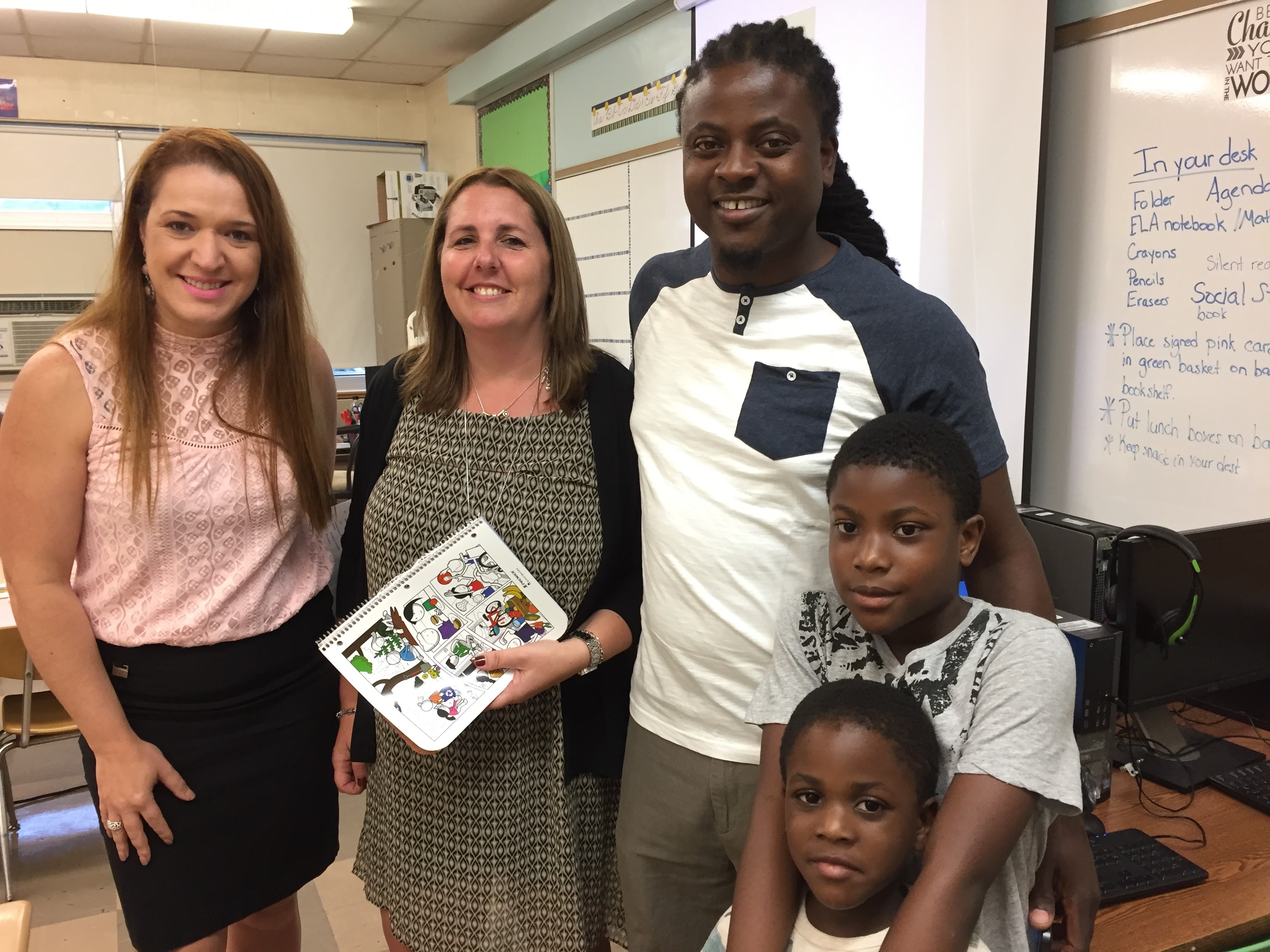 Family and teacher at Open House