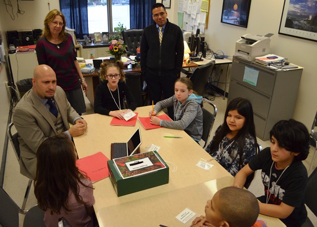 Another picture of Students and Superintendent Padilla discussing topics on interest to the students