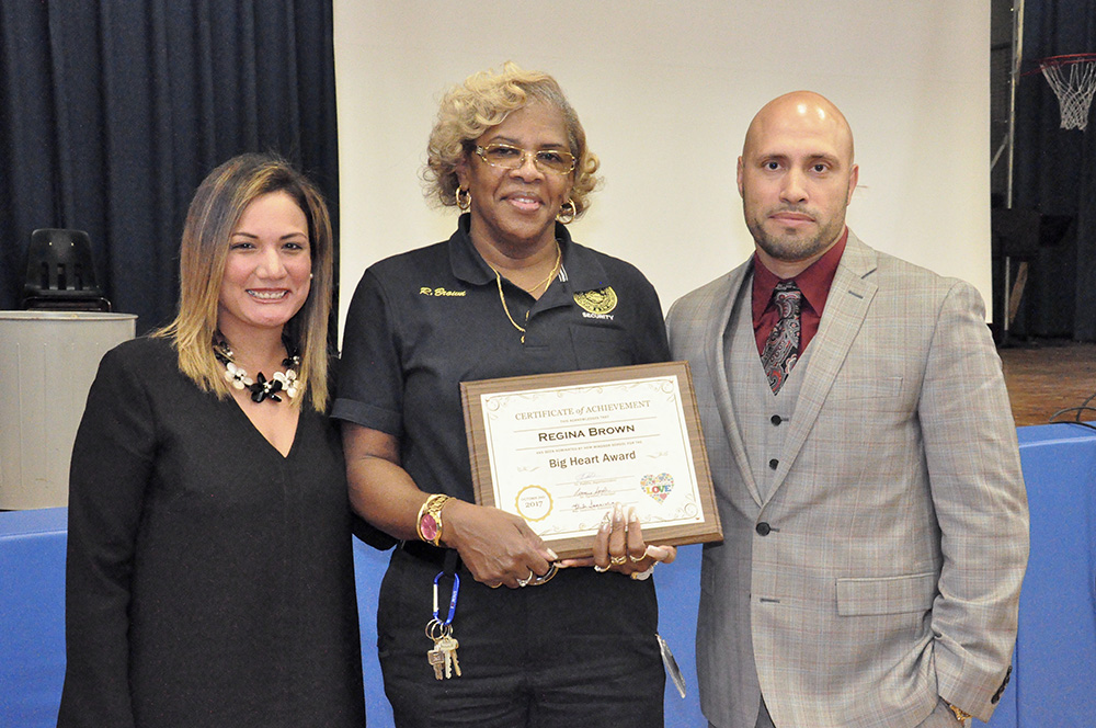 Security Guard Regina Brown with Principal and Superintendent