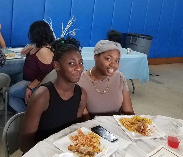 Two students at their table