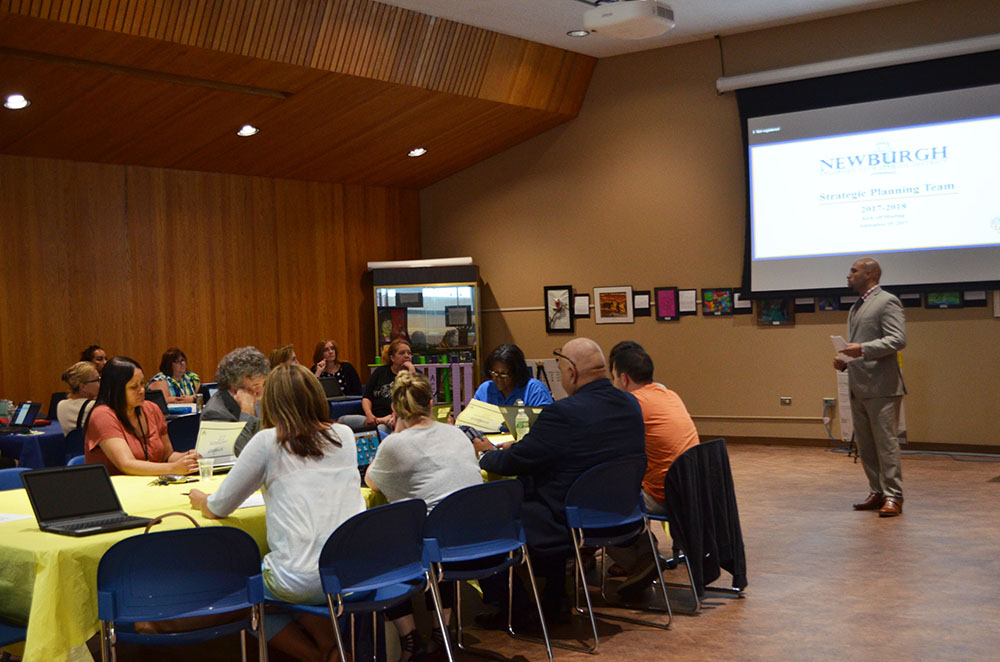 Members of the Strategic Planning Team discuss this year's focus. Photo 2