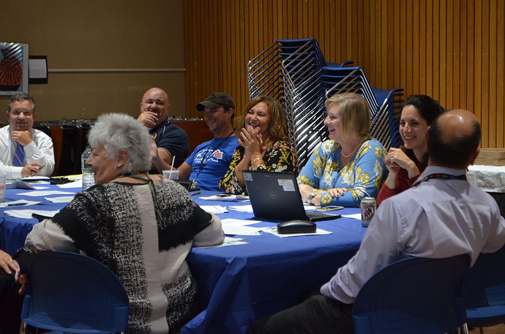 Members of the Strategic Planning Team discuss this year's focus. Photo 4