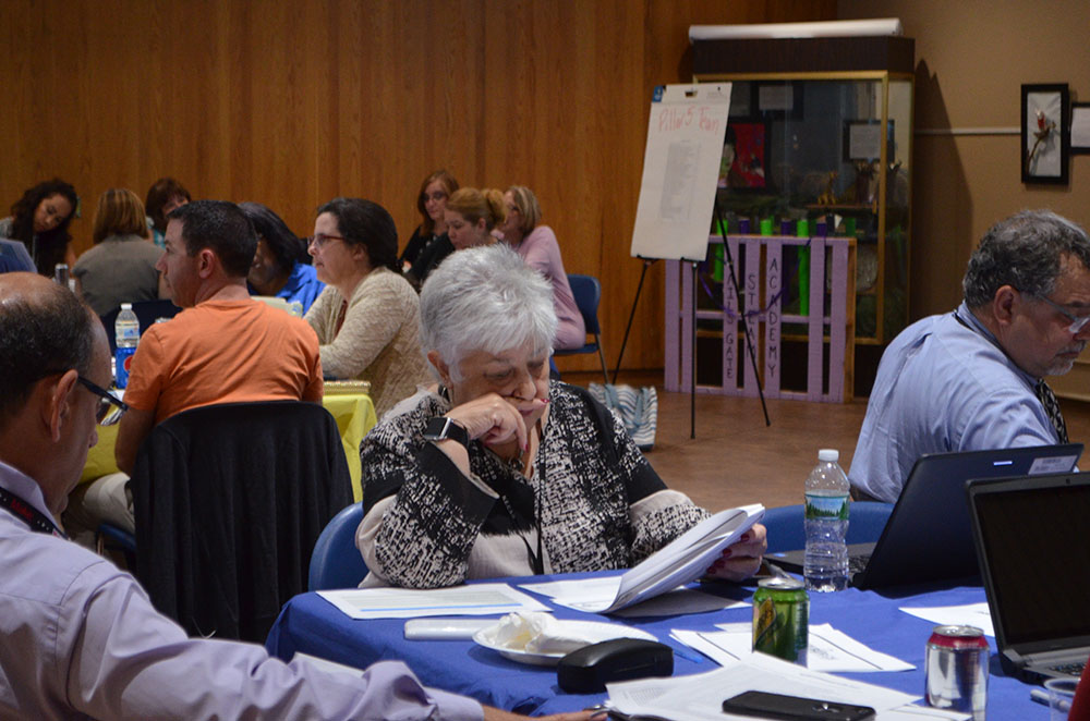 Members of the Strategic Planning Team discuss this year's focus. Photo 5