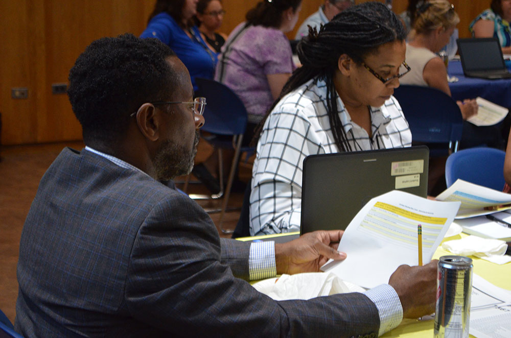 Members of the Strategic Planning Team discuss this year's focus. Photo 6