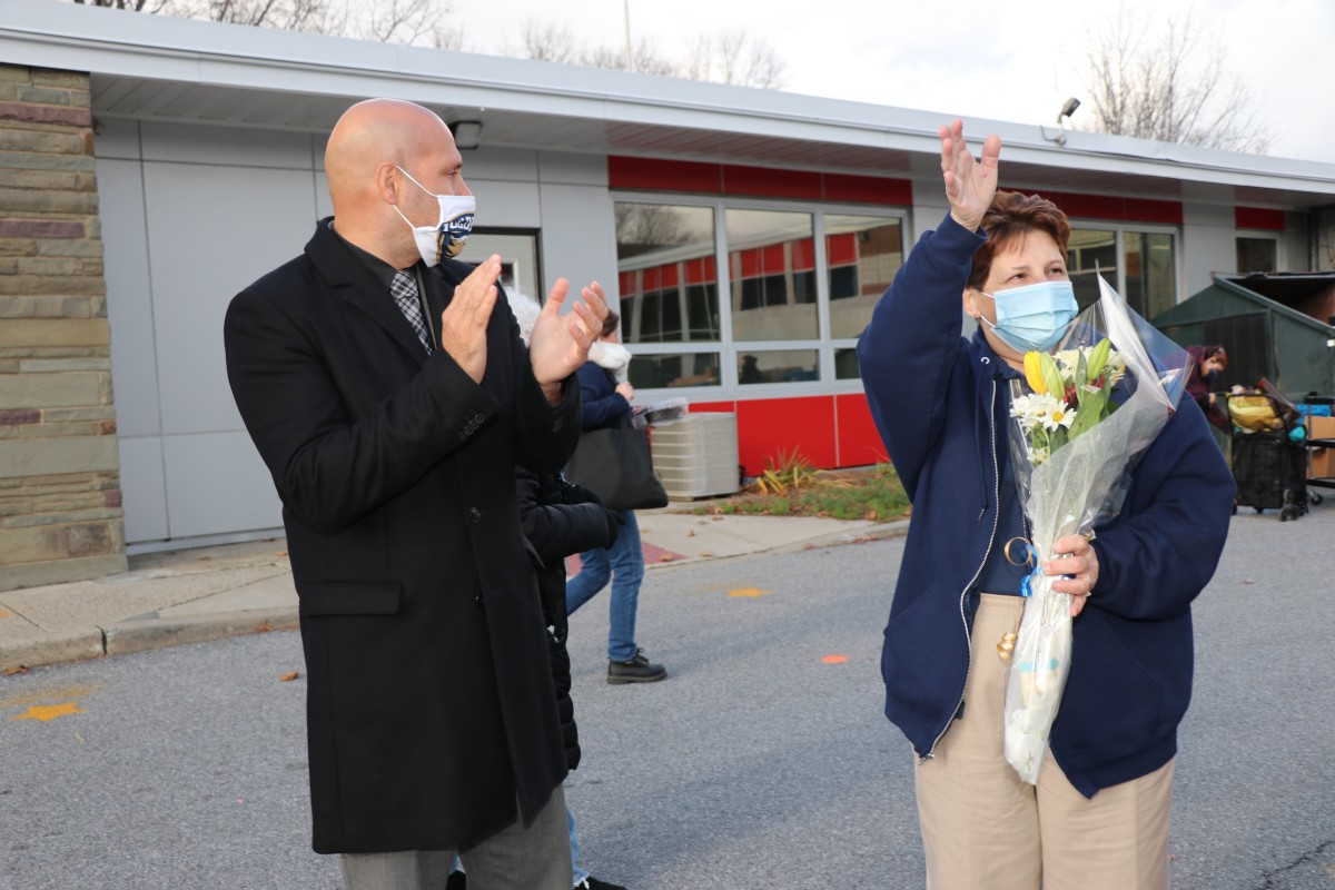 Dr. Padilla celebrates GAMS cafeteria manager.