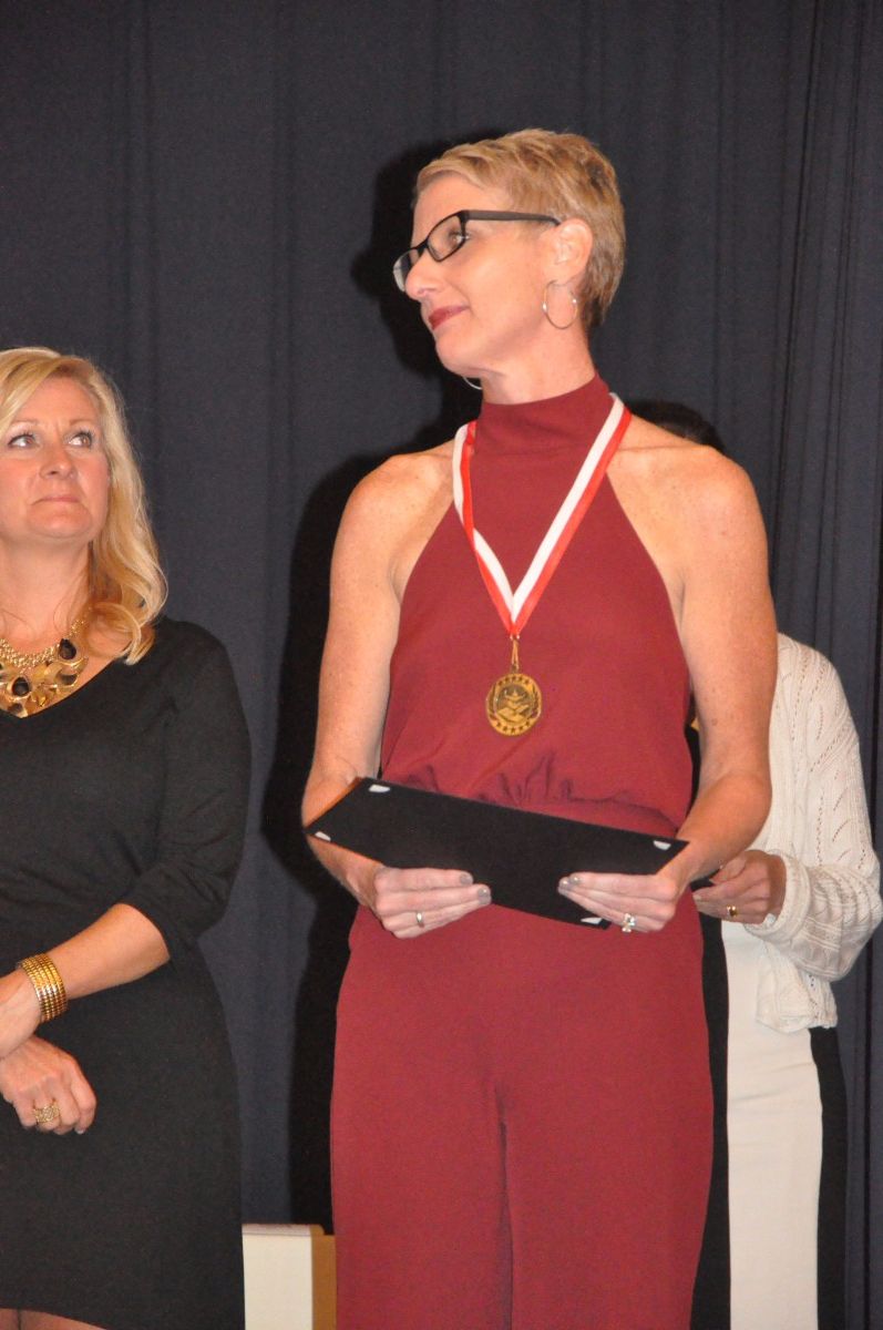 Ms. Lofaro accepts her award