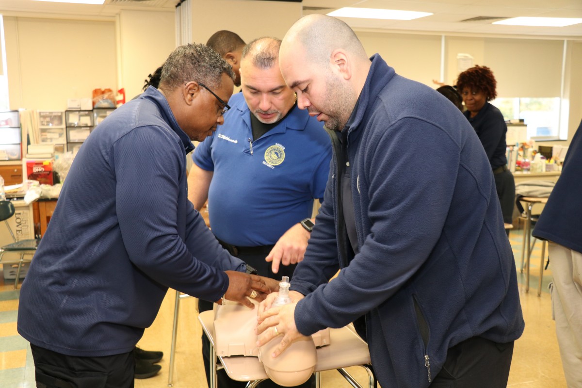 Senior school monitor, Mr. David Maldonado instructs security guards on technique.