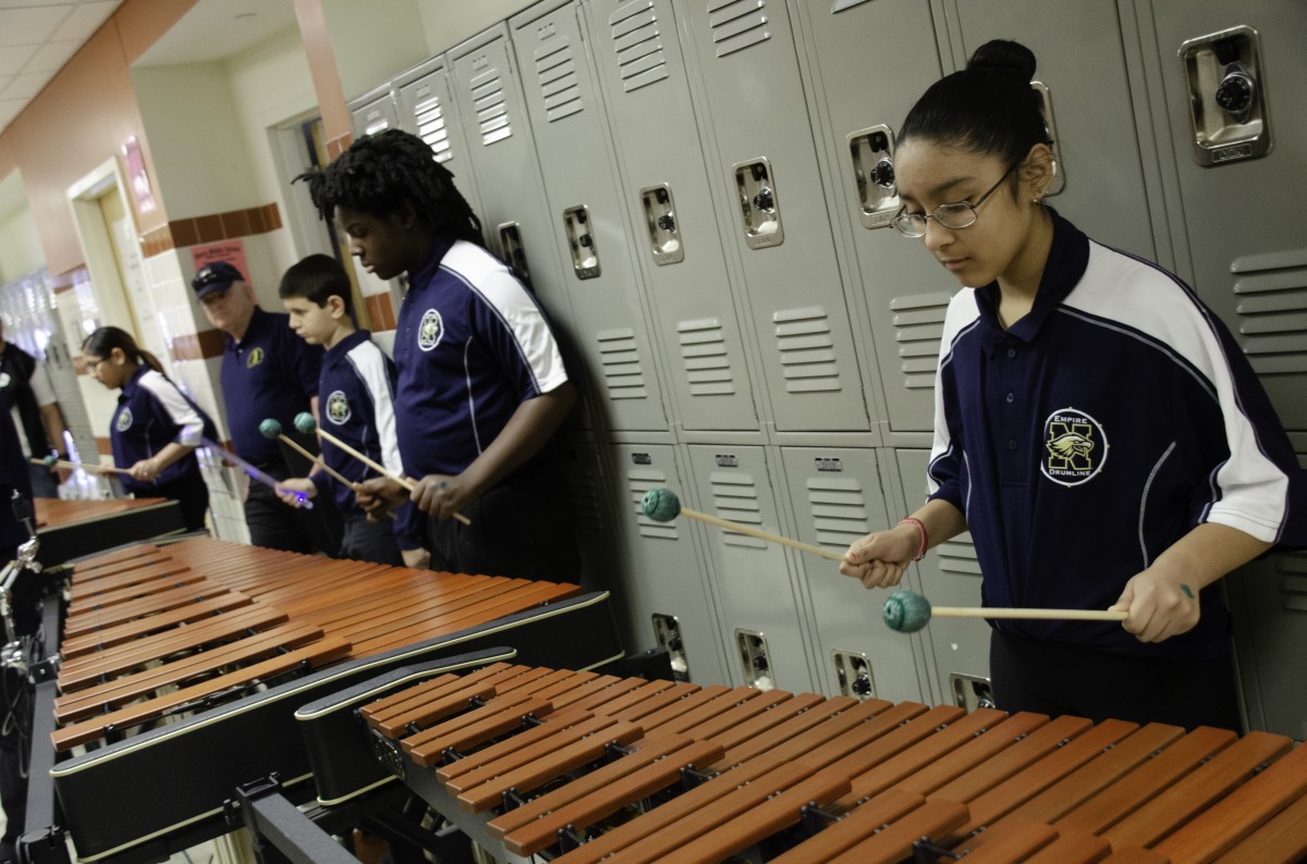 Students performing in the Drumline.