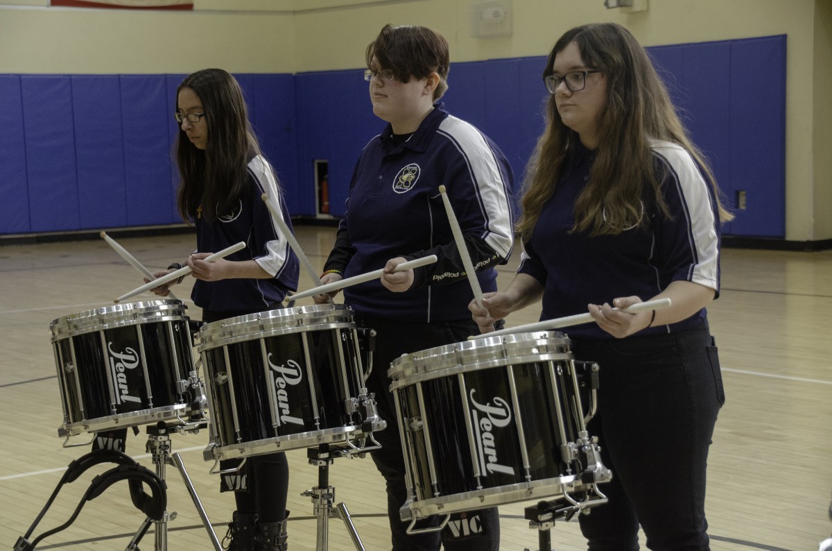 Students performing in the Drumline.