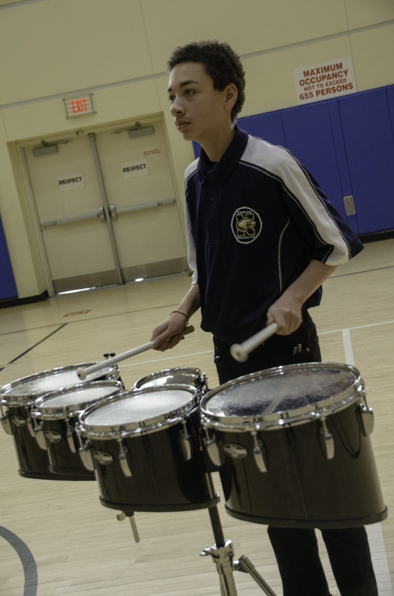 Students performing in the Drumline.