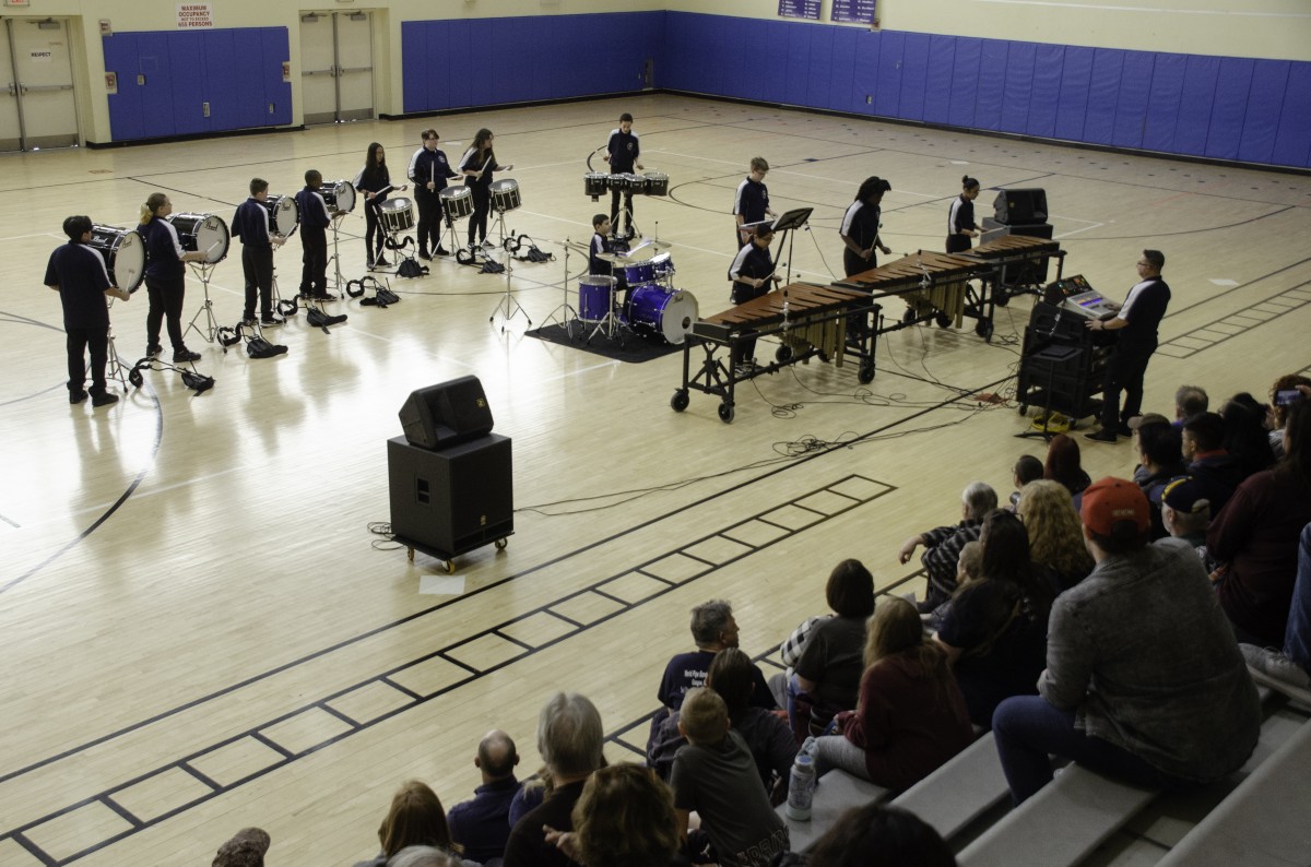 Students performing in the Drumline.