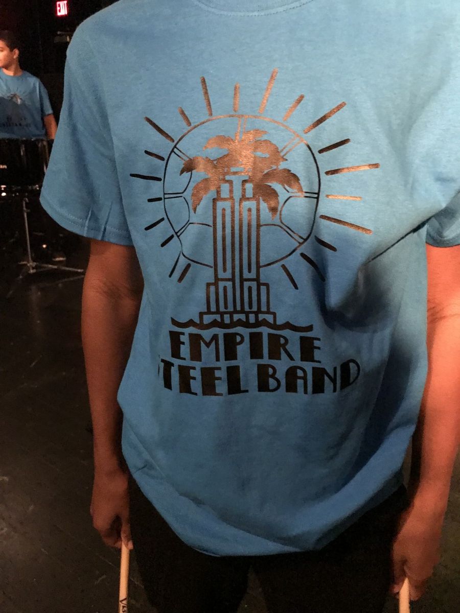 T-shirt worn by the group.