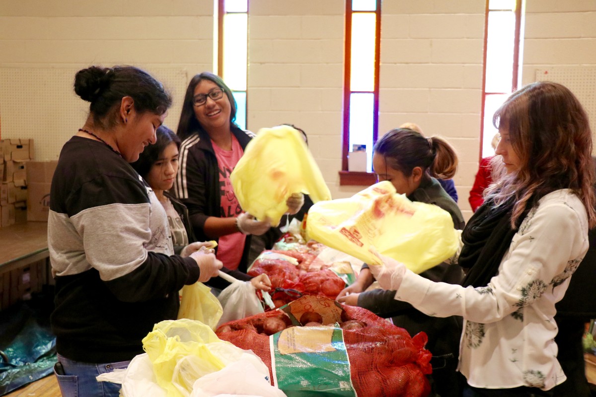 Students gather and organize food items