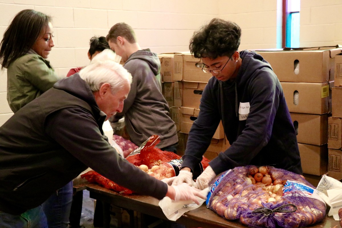 Students gather and organize food items