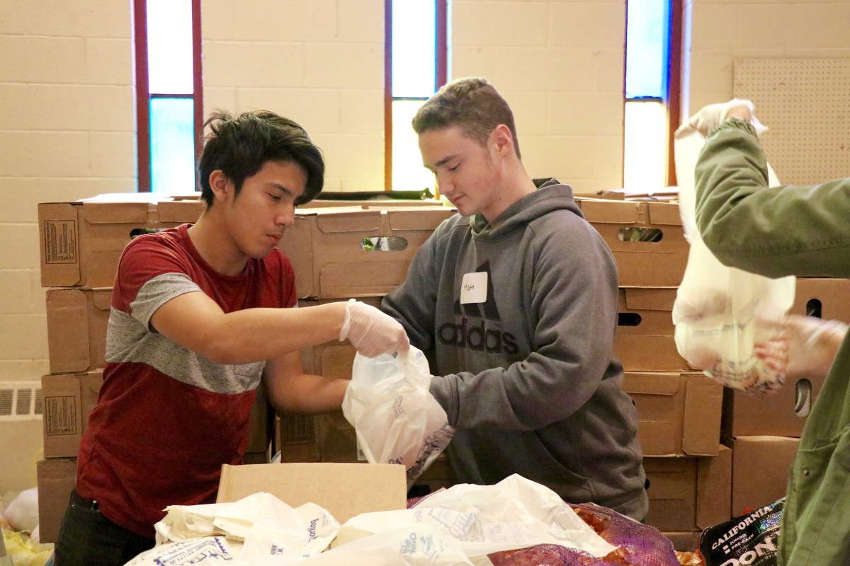 Students gather and organize food items