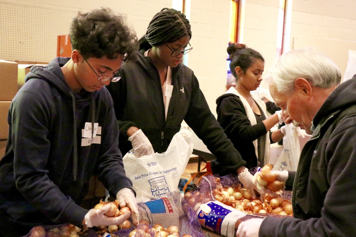 Students gather and organize food items