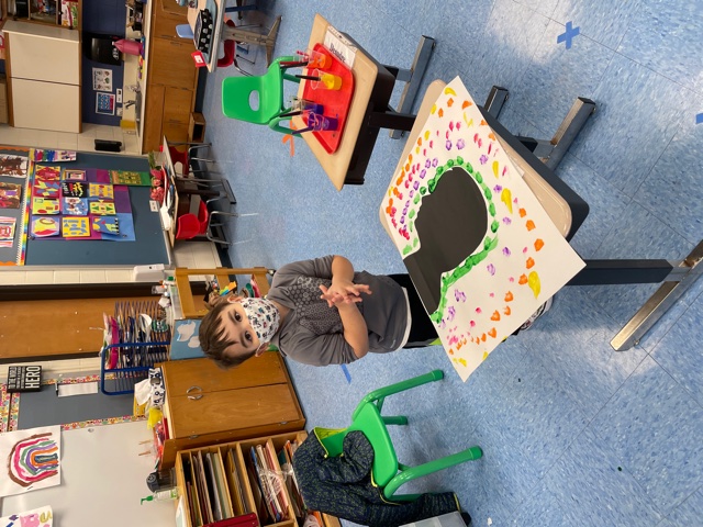 Pre-K Scholar creates artwork in celebration of Pre-K scholar, Hendrix Kulisek gave a brief presentation about Artist, Alma Woodsey Thomas as part of Black History Month.