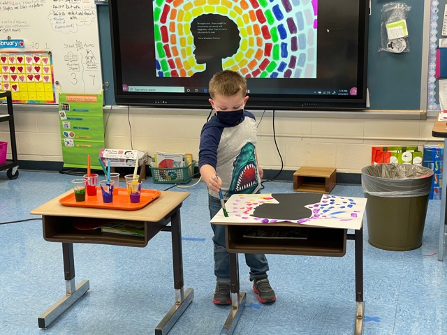 Pre-K Scholar creates artwork in celebration of Pre-K scholar, Hendrix Kulisek gave a brief presentation about Artist, Alma Woodsey Thomas as part of Black History Month.