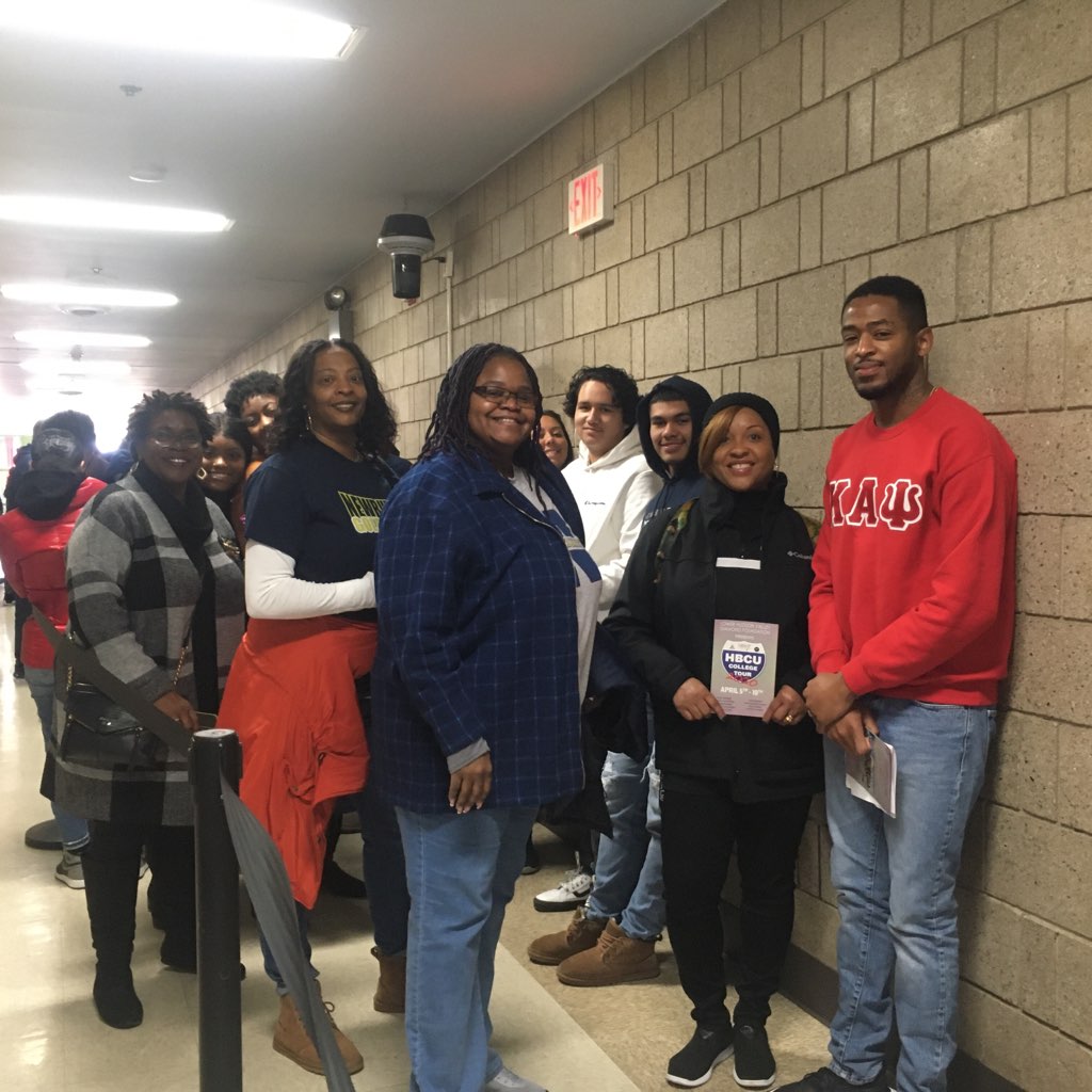 Chaperones in line with the students.