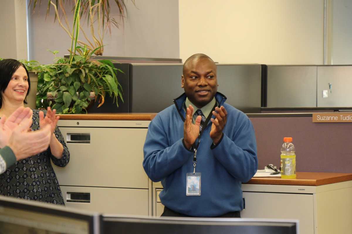 Mr. Rodney Asse, Assistant Superintendent for Finance applauds his team.