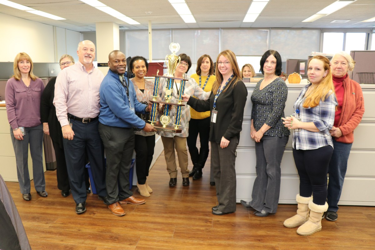 The Finance Department poses for a photo.