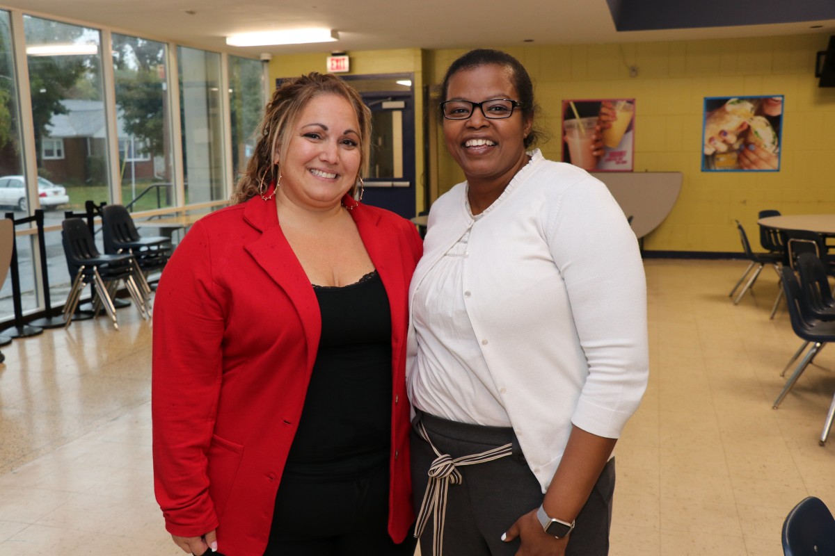 Mentor and mentee pose for a photo.