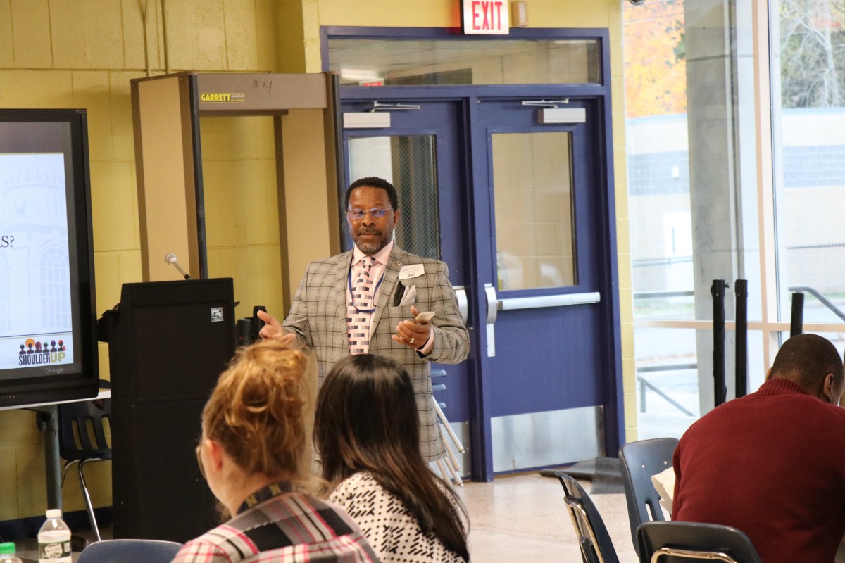 Mr. McLymore, Assistant Superintendent for Human Resources addresses attendees.