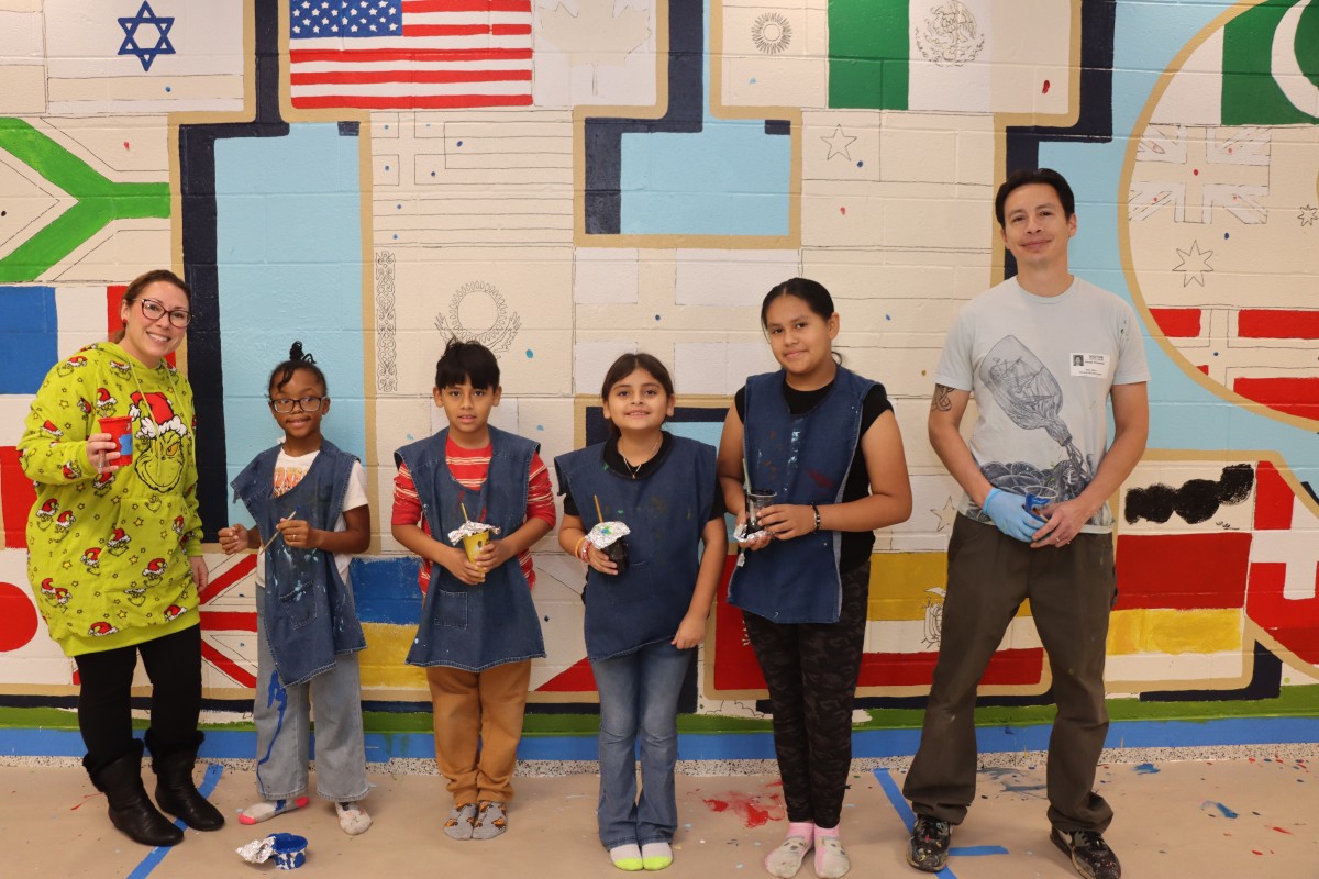 Thumbnail for Meadow Hill Scholars Join with Alumnus to Create Colorful Cultural Mural