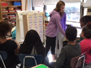 Students in Ms. Hoffman's class share their math games with students from Mrs. St. Clair's class.