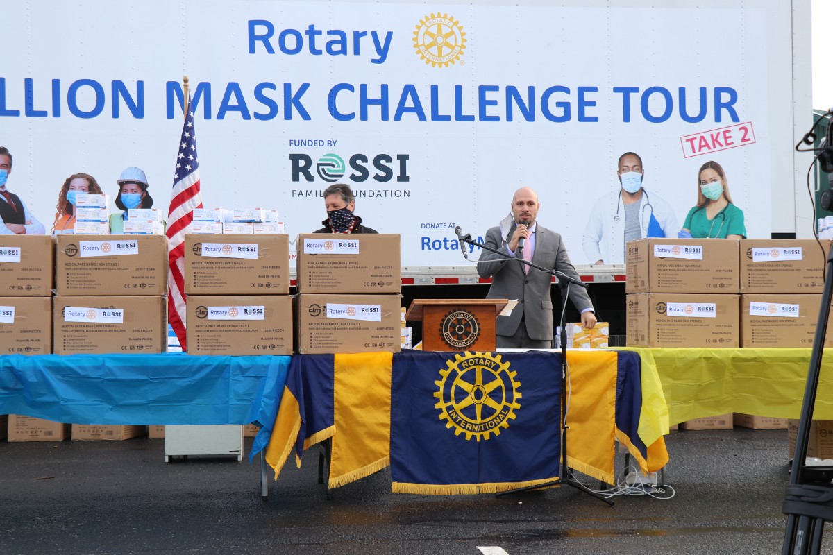 Dr. Padilla addresses the group during distribution.