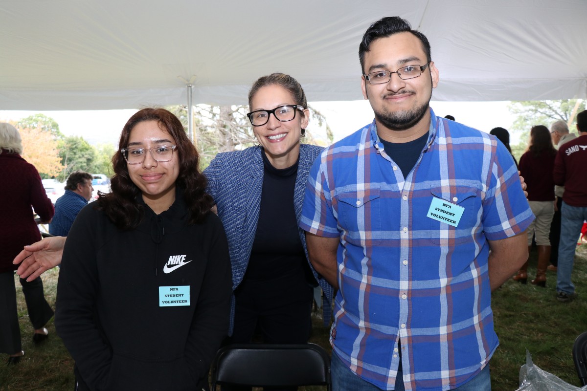 Students pose with Director of Social Students, Ms. Amanda Greene.