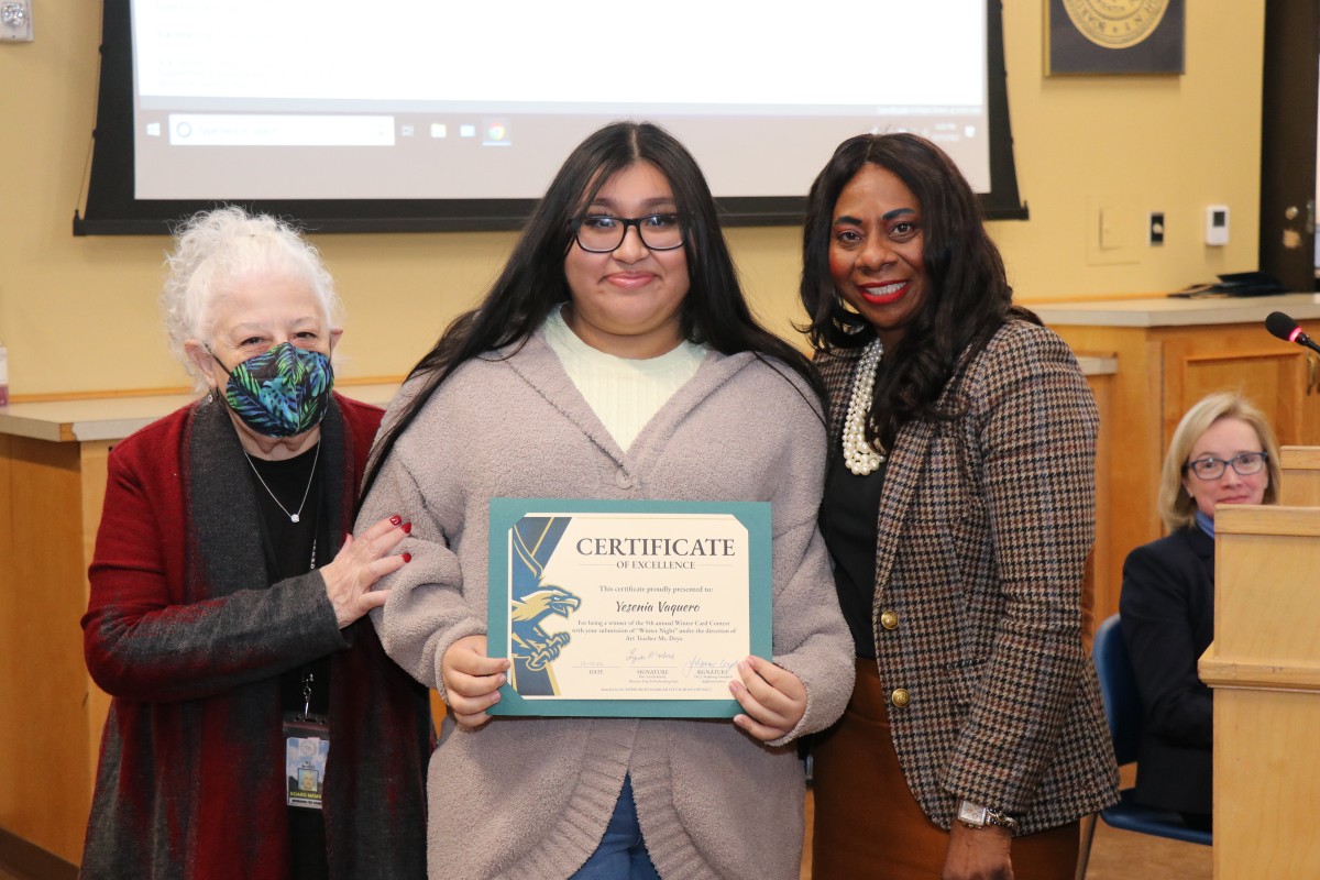 Yesenia Vaquero poses for a photo with BOE President, Ms. Carole Mineo and NECSD Superintendent, Dr. Manning Campbell.