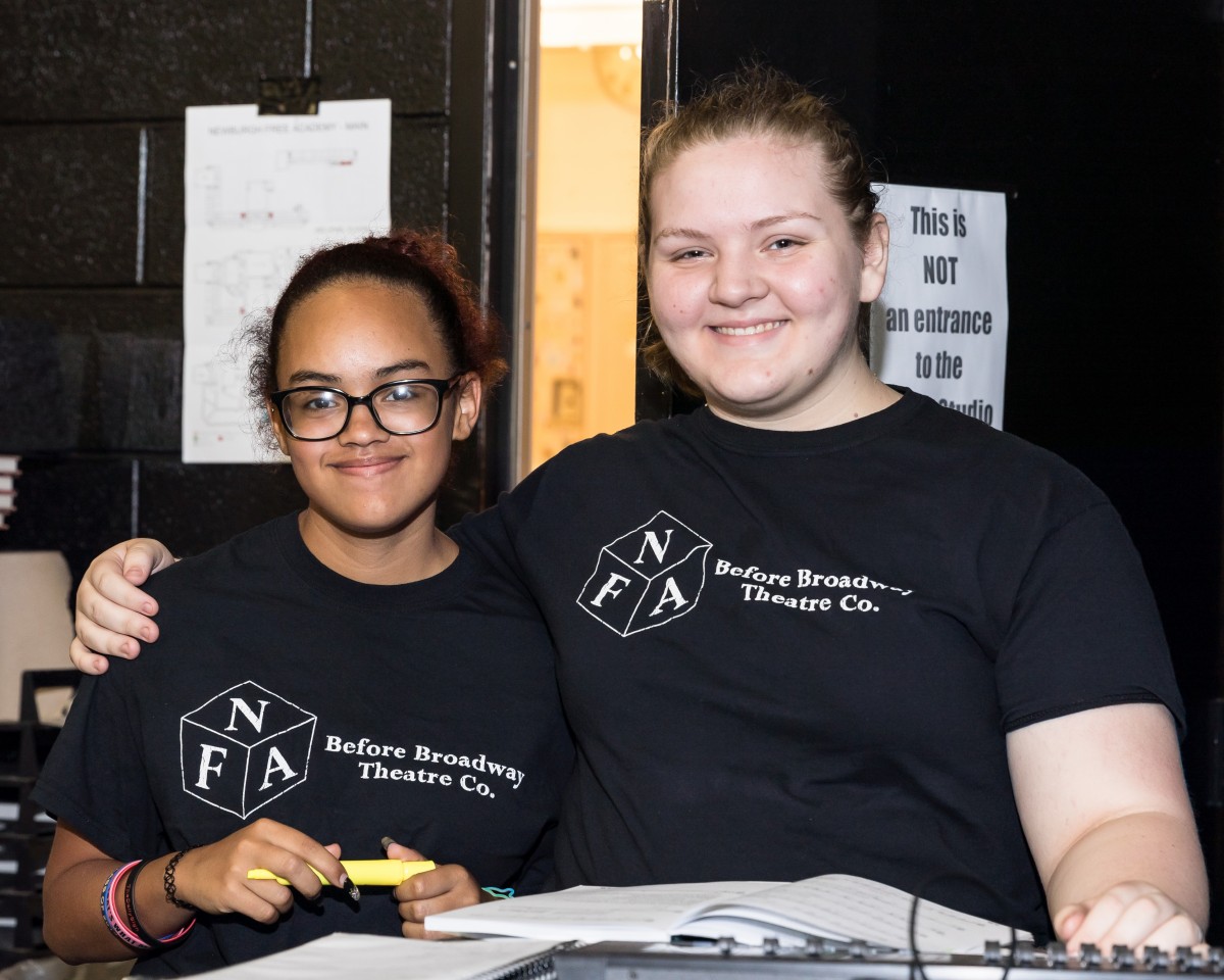 Student volunteers pose for a photo.