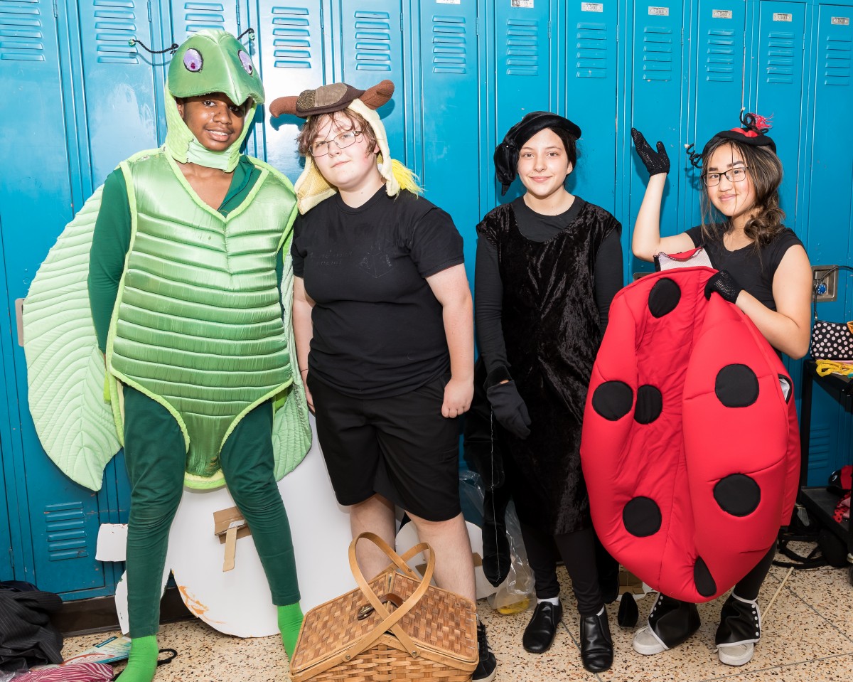 Students pose in costume.