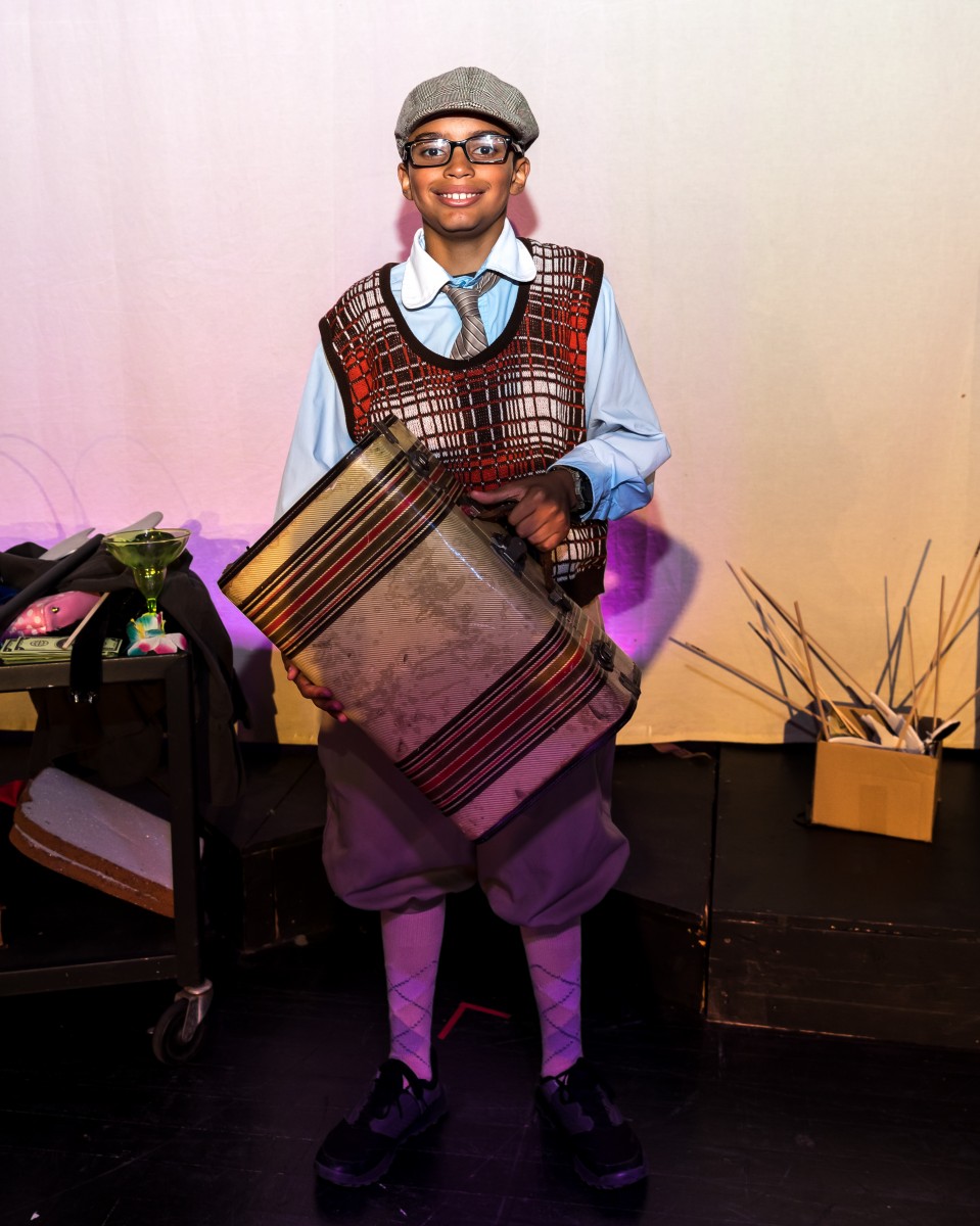 Student poses in costume.