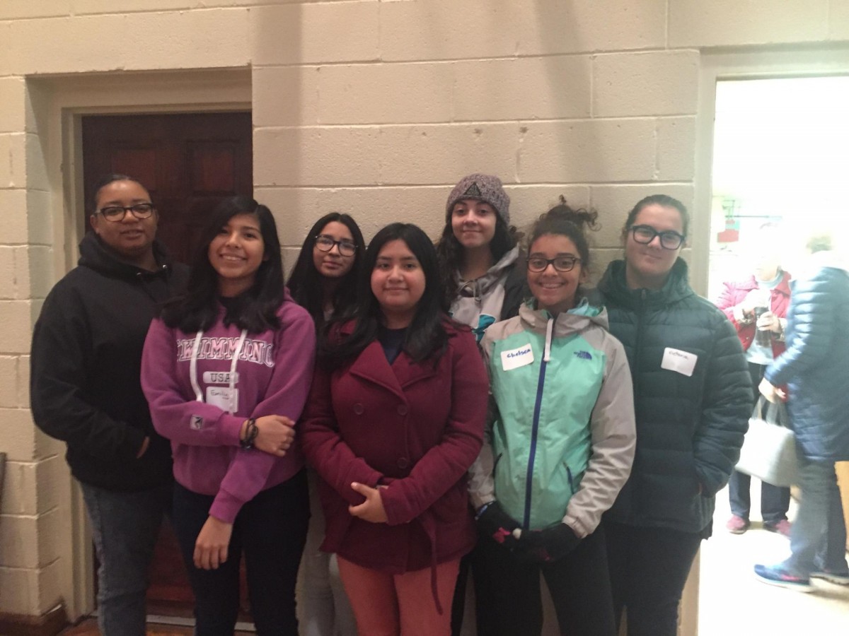 Girls to Ladies group poses after volunteering