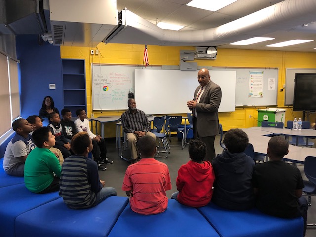 Principal Kafele speaking to scholars at Balmville Elementary School.