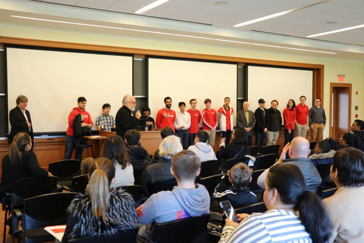 Students receive information during presentation.