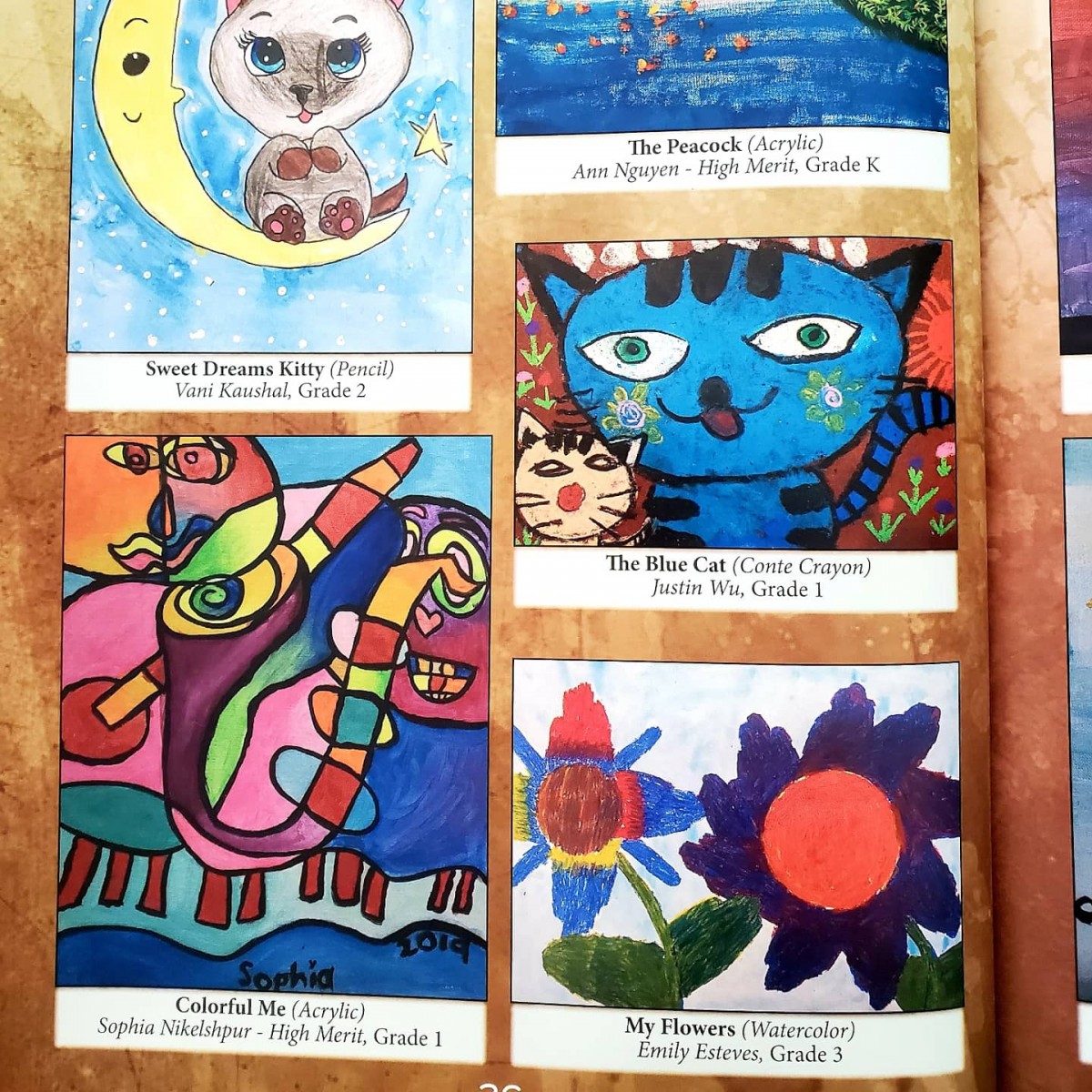 Pages of the book with artwork submitted by Meadow Hill scholars.