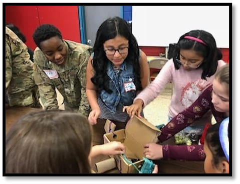 The 5th grade girls showed their creativity and ingenuity by working as a team to develop objects from the given materials.