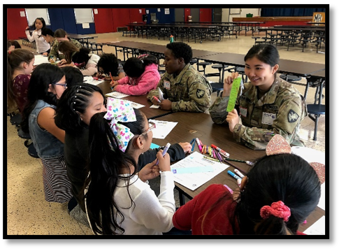 Cadet Anujin Gankhuyag encouraged the girls as they chose words that represented their confidence for their bookmarks.